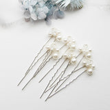 a bunch of pins sitting on top of a table