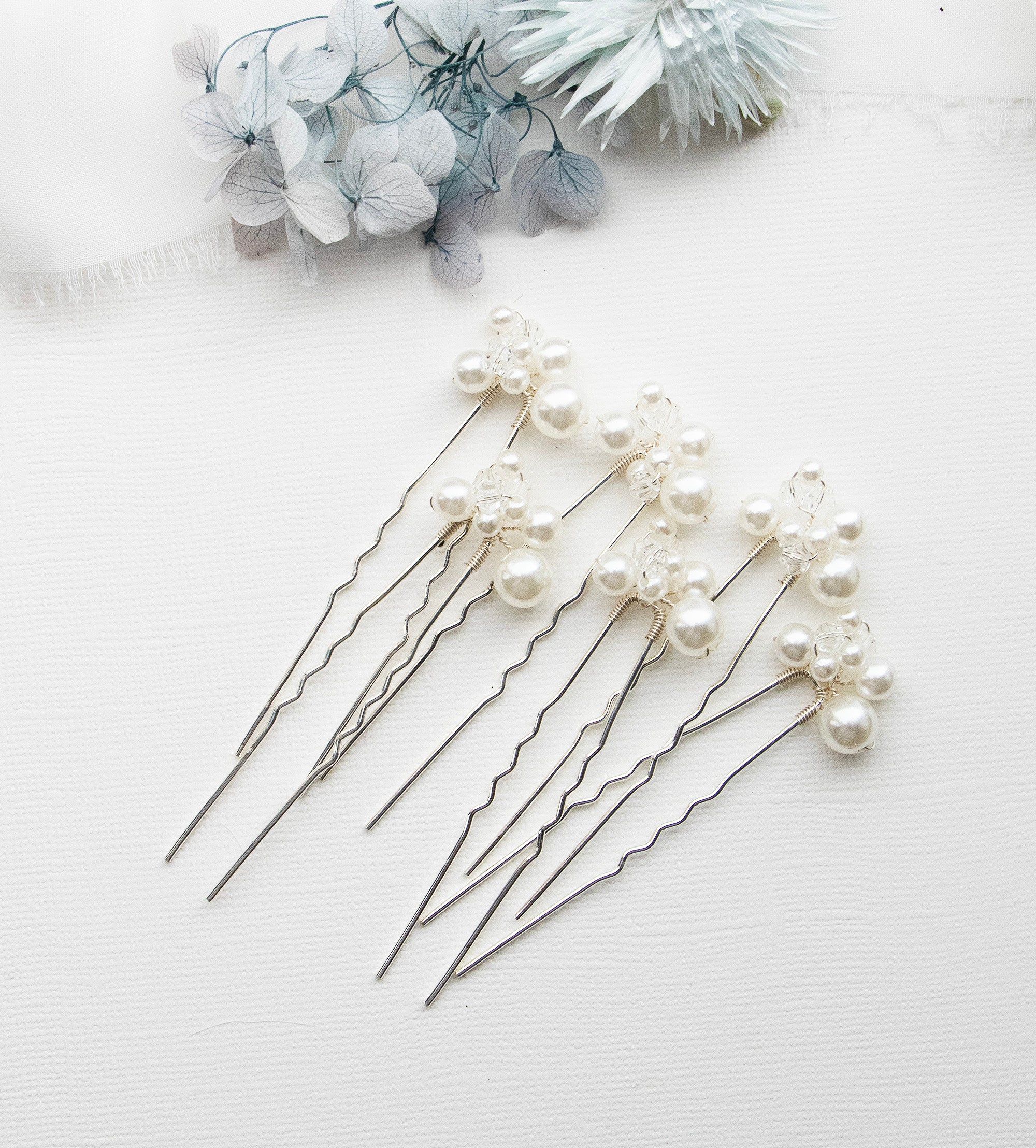a bunch of pins sitting on top of a table