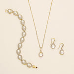 a necklace, earring, and necklace with a diamond set