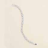 a diamond bracelet on a white background