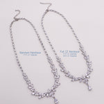 a necklace with a cross on it is shown