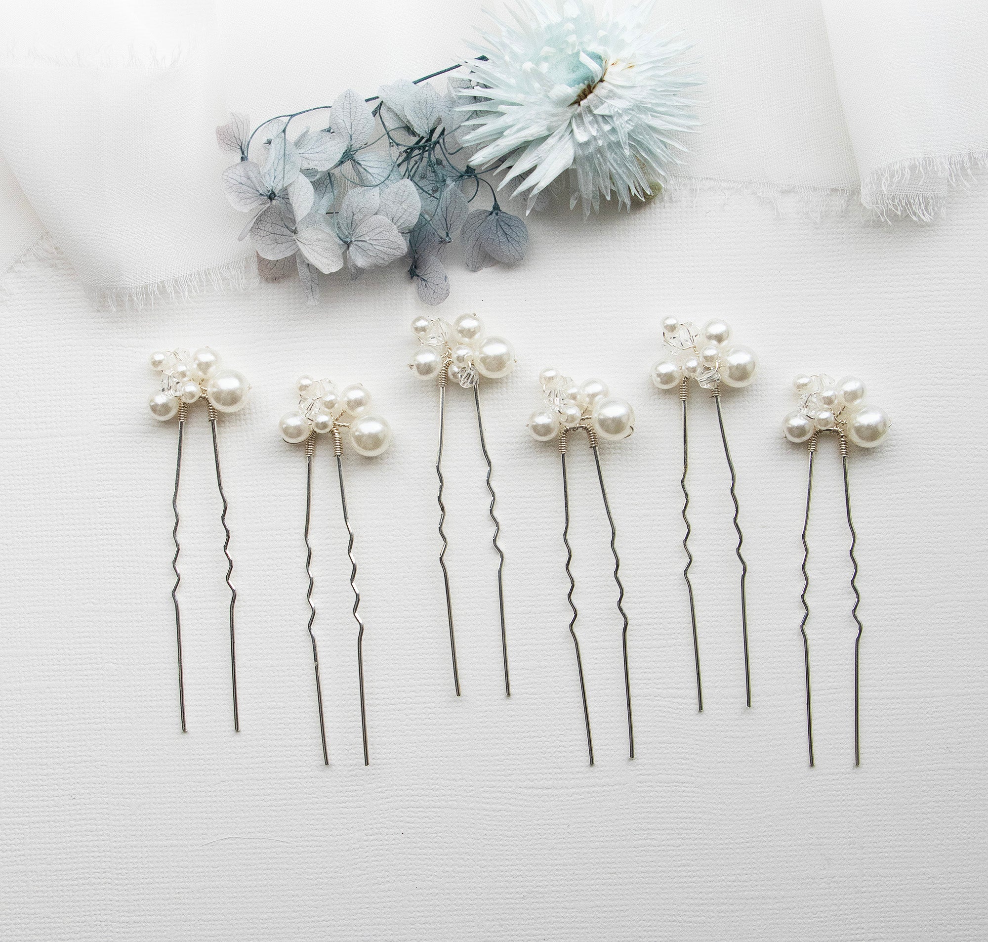 a bunch of pins sitting on top of a table