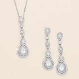 a couple of necklaces that are on a table