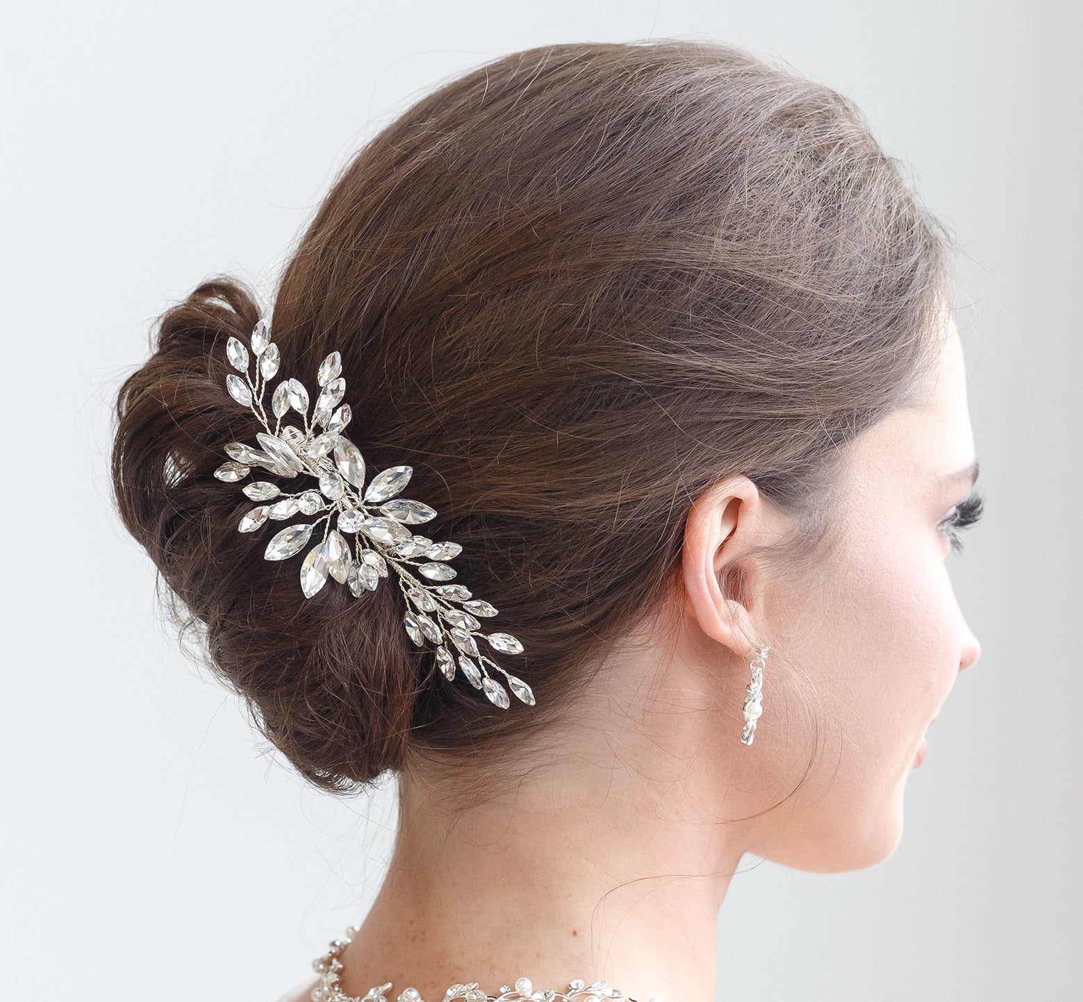 a woman with a hair comb in her hair
