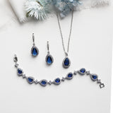 a necklace and earring set with blue stones