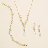 a necklace and earring set with a chain