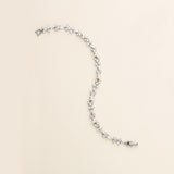 a white pearl necklace with a silver clasp