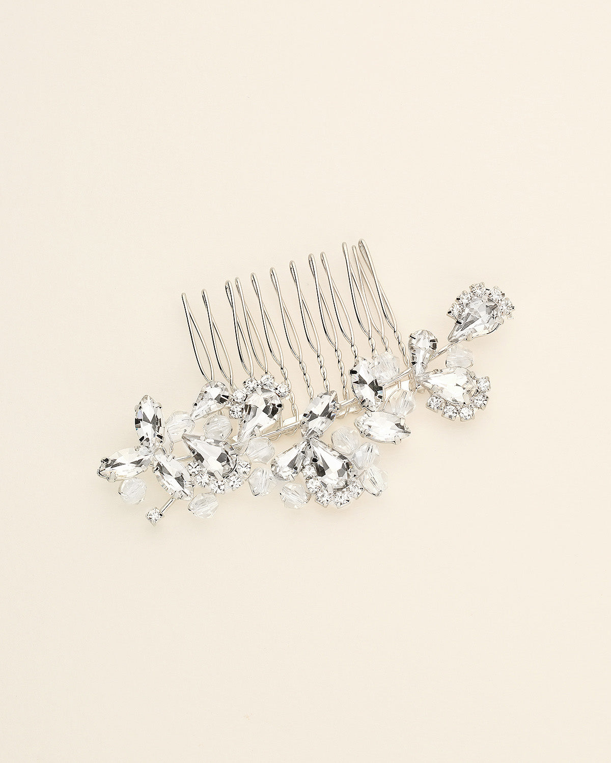 a set of three crystal hair combs