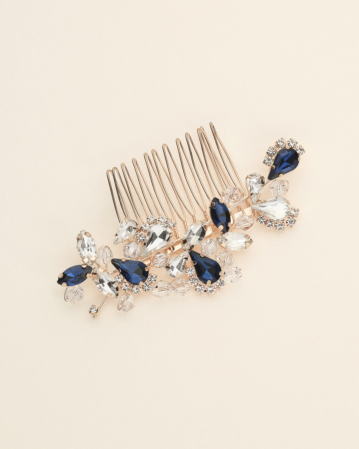 a close up of a hair comb on a white surface