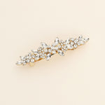 a brooch with a bunch of flowers on it