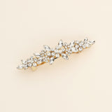 a brooch with a bunch of flowers on it