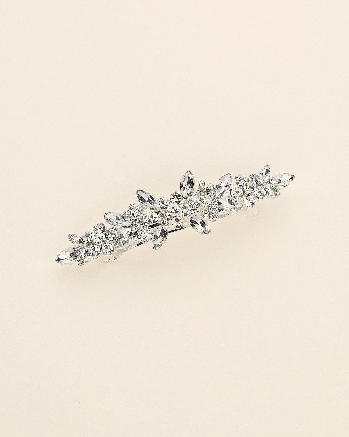 a close up of a brooch on a white background