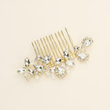 a hair comb with a bunch of crystals on it