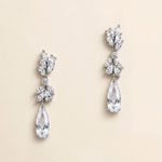 A pair of elegant earrings with large, clear gemstones hanging from the bottom.