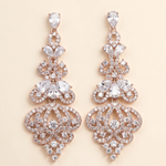 A pair of elegant gold earrings adorned with numerous sparkling diamonds.