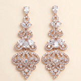 A pair of elegant gold earrings adorned with numerous sparkling diamonds.