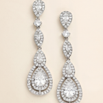 A pair of elegant diamond earrings with multiple tiers of sparkling crystal stones.