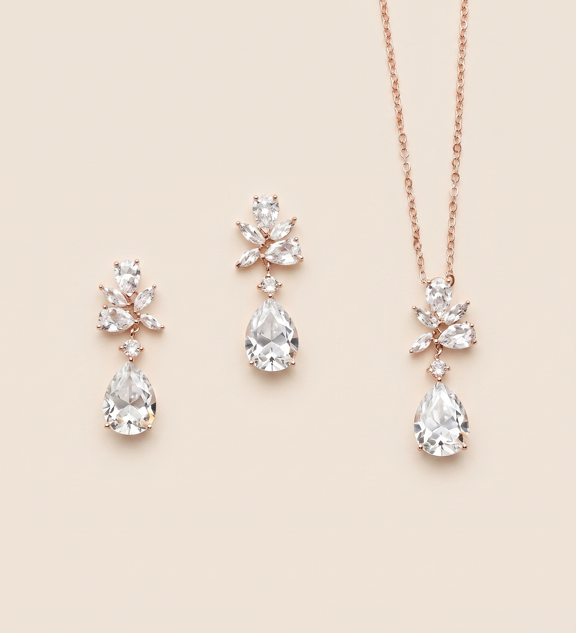 a set of elegant jewelry pieces, including a necklace and earrings, all featuring large, clear gemstones.