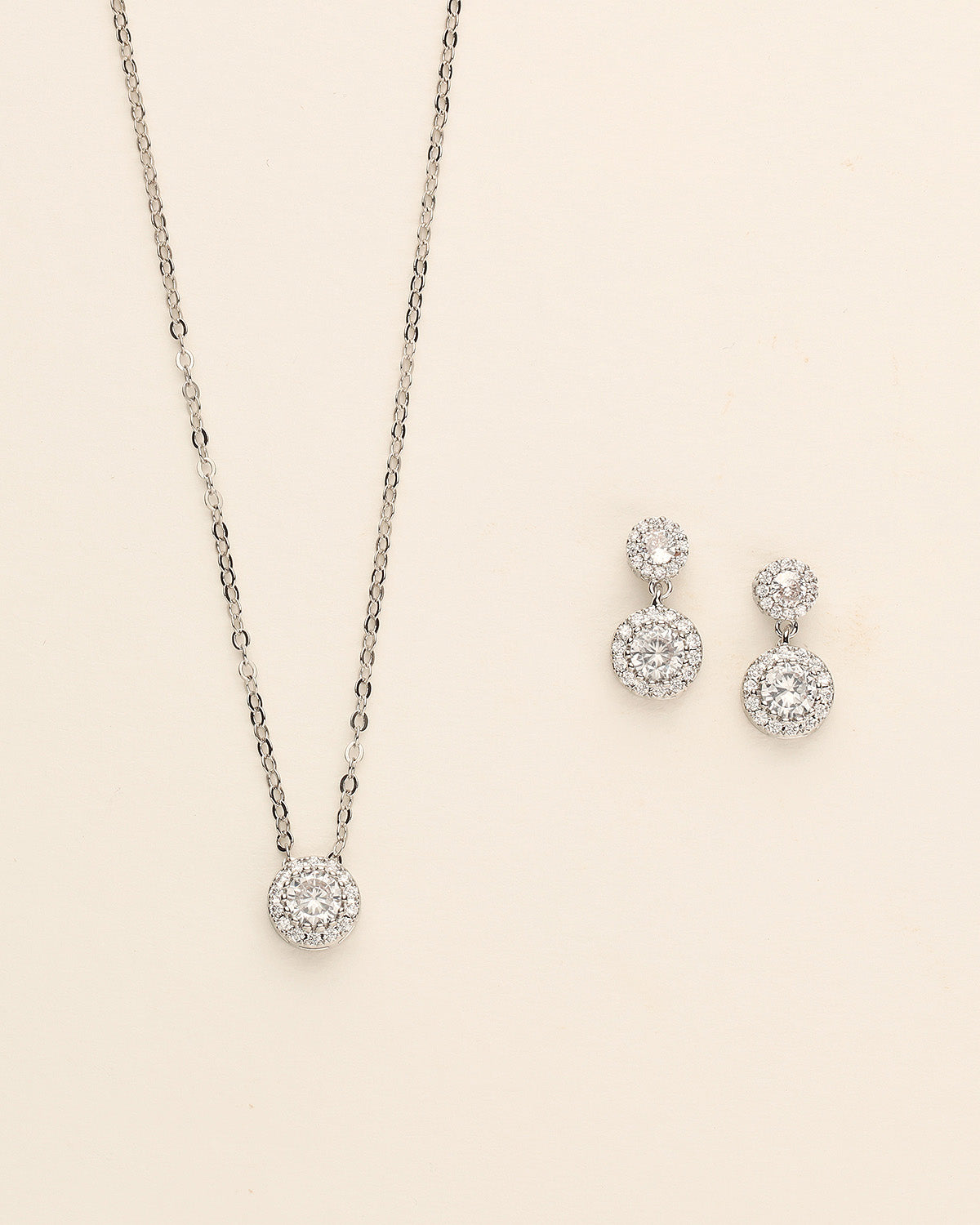 a couple of necklaces and a pair of earrings