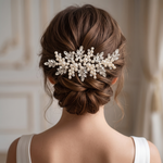 the back view of a woman's head, focusing on her hair and the decorative hair accessory she is wearing.