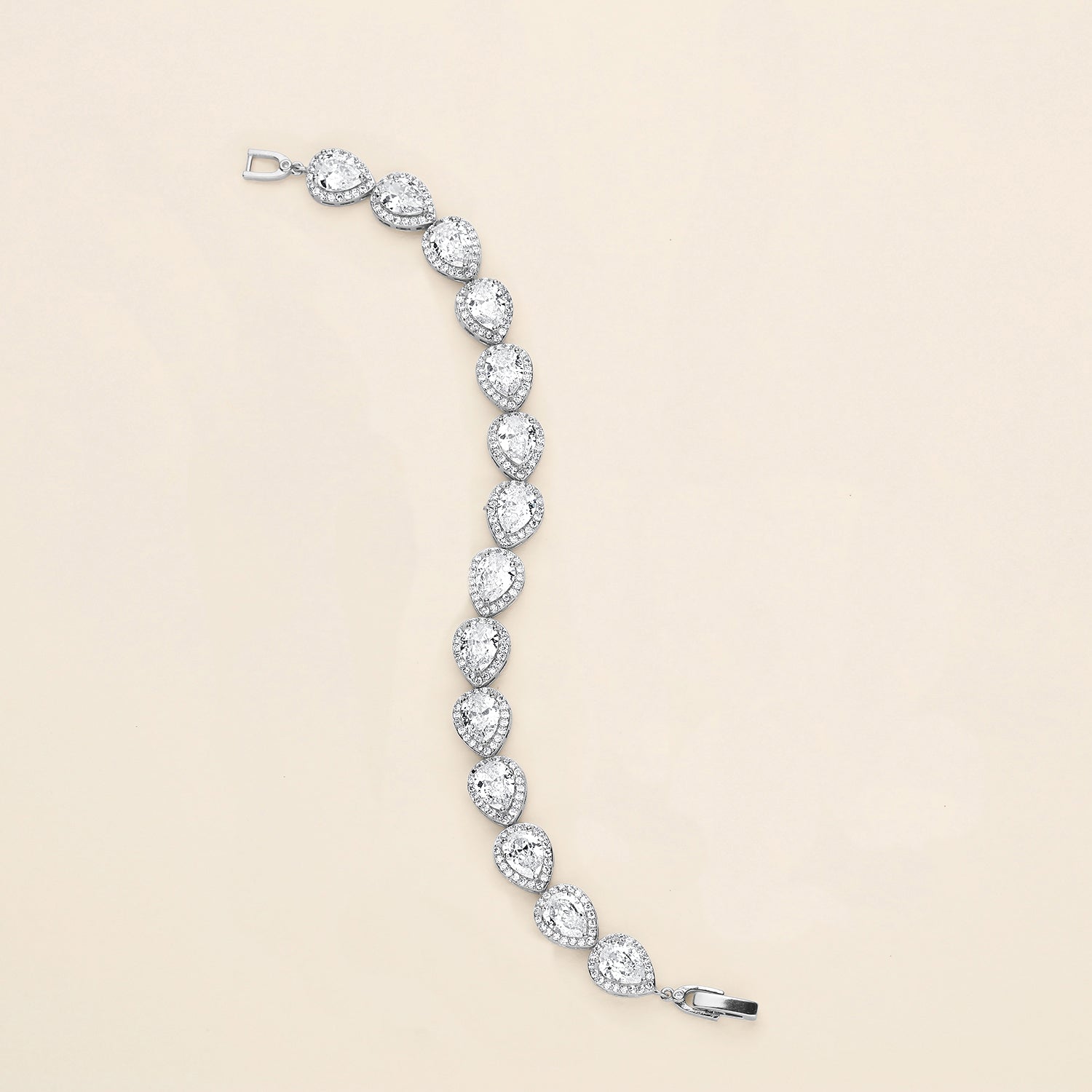 A long, elegant necklace with numerous sparkling diamonds arranged in a curved pattern.
