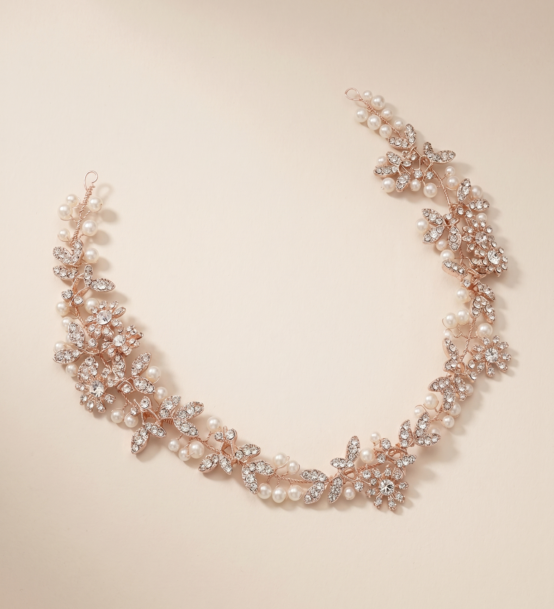 A delicate necklace with a floral design and sparkling rhinestones.