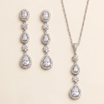 a necklace and earrings set with sparkling crystal elements.