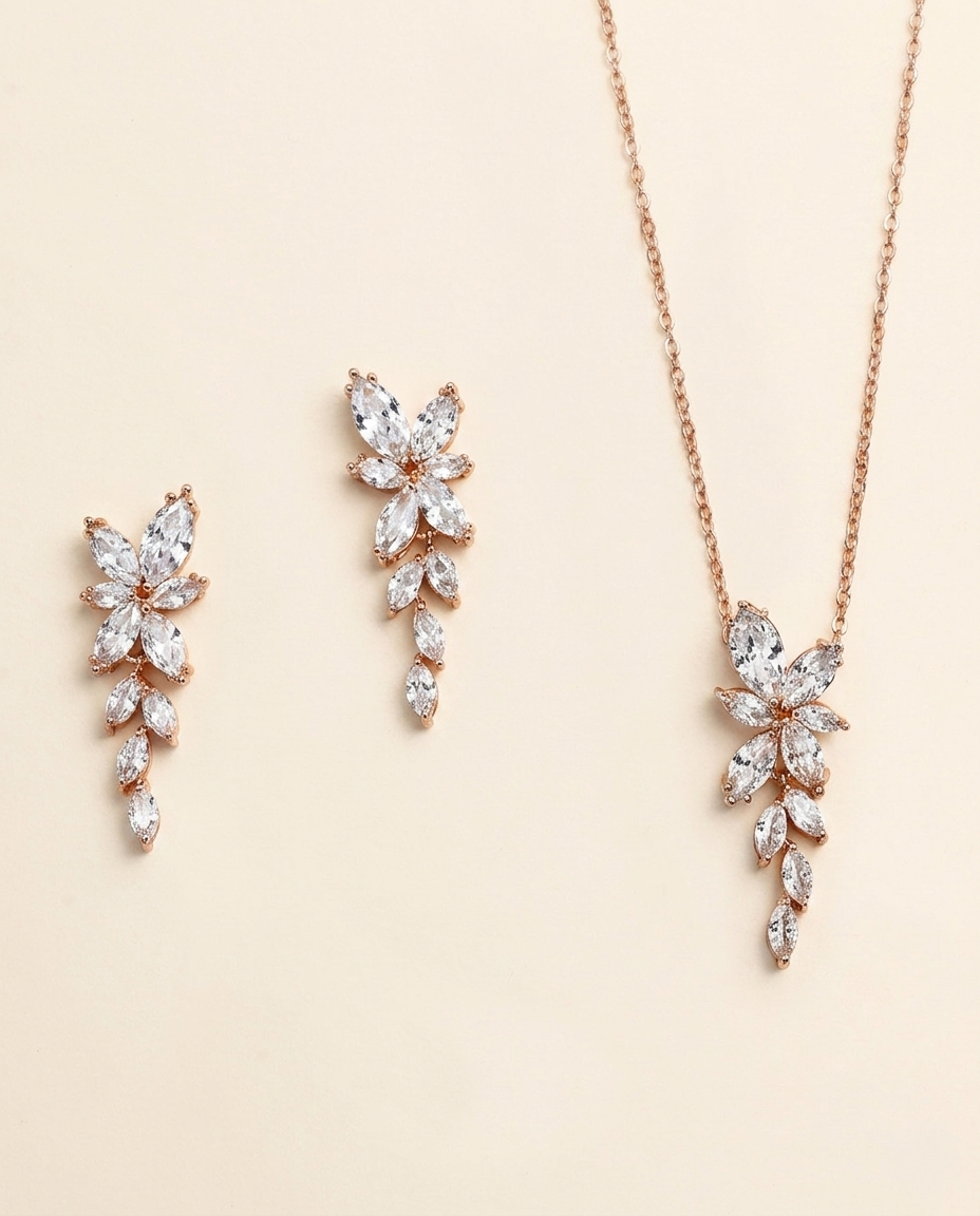 a set of elegant jewelry pieces, including earrings and a necklace, featuring delicate and intricate designs.