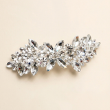 A decorative hair clip made of numerous sparkling crystal stones.