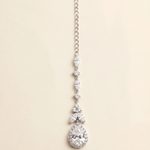 A necklace with a large, sparkling diamond pendant hanging from a chain.