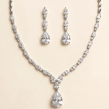 A necklace and earrings set made of sparkling diamonds.
