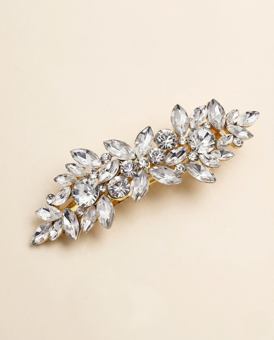 A decorative hair clip adorned with numerous sparkling crystal stones.