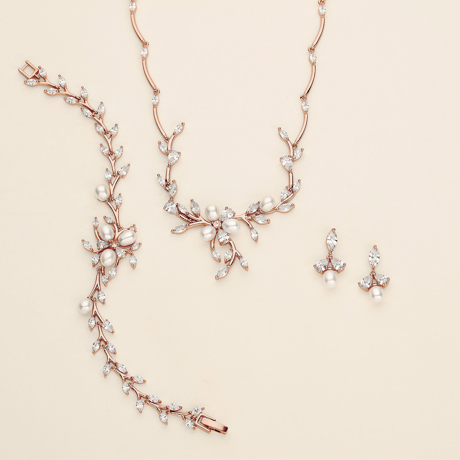 a set of jewelry including a necklace and earrings