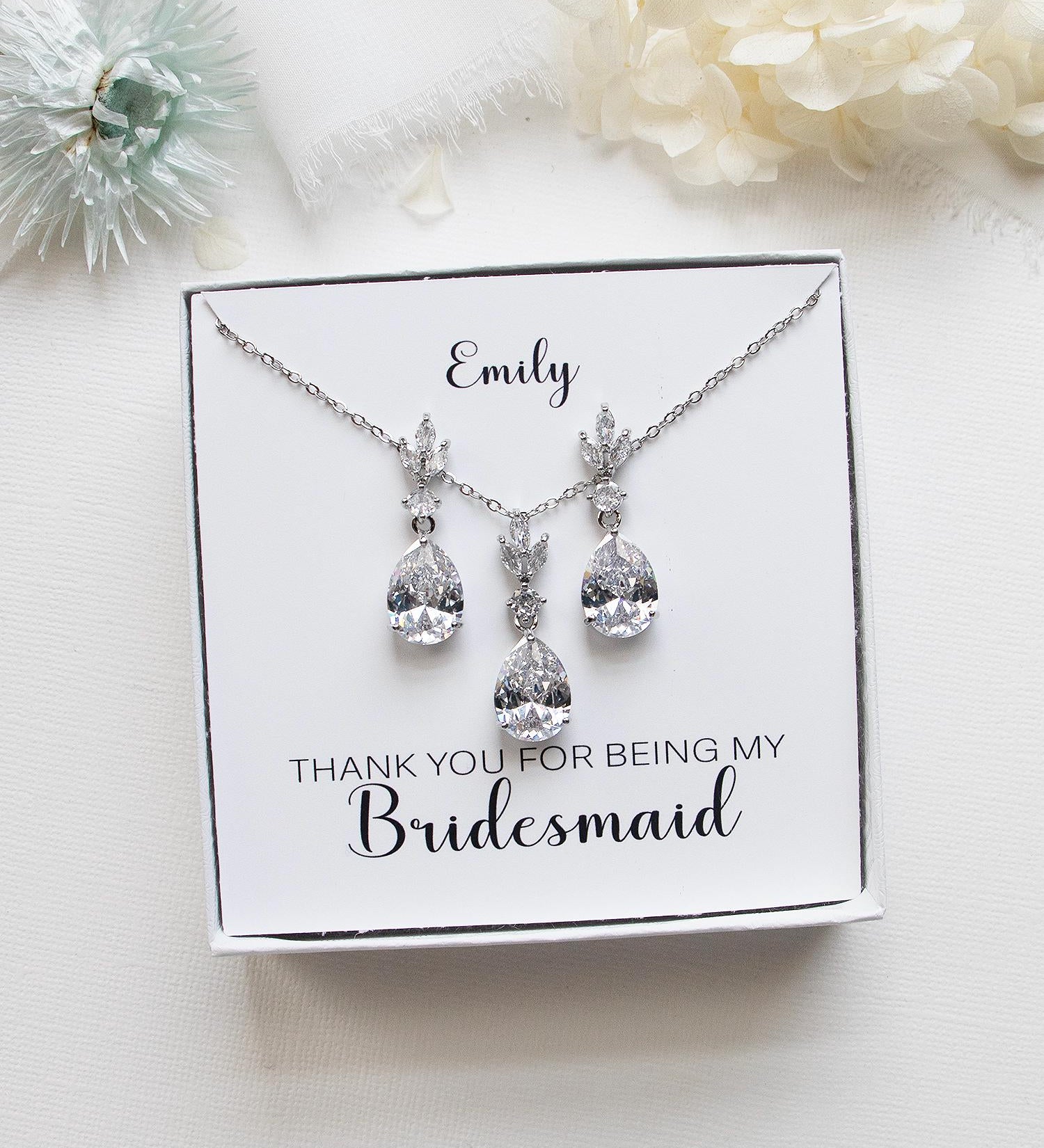 a bridesmaid necklace and earrings set in a gift box