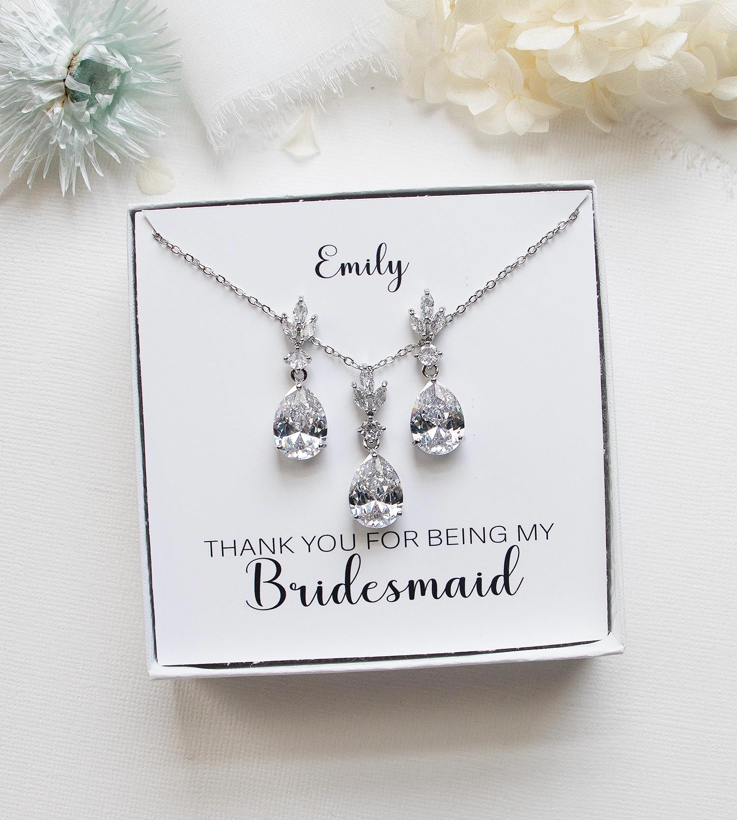 a bridesmaid necklace and earrings set in a gift box