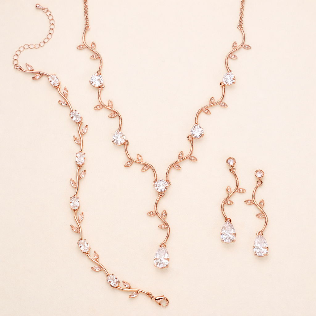 a delicate and elegant necklace and earring set, featuring a delicate chain with small, clear gemstones and a pair of dangling earrings with similar clear gemstones.