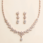 a necklace and earrings set made of sparkling diamonds.