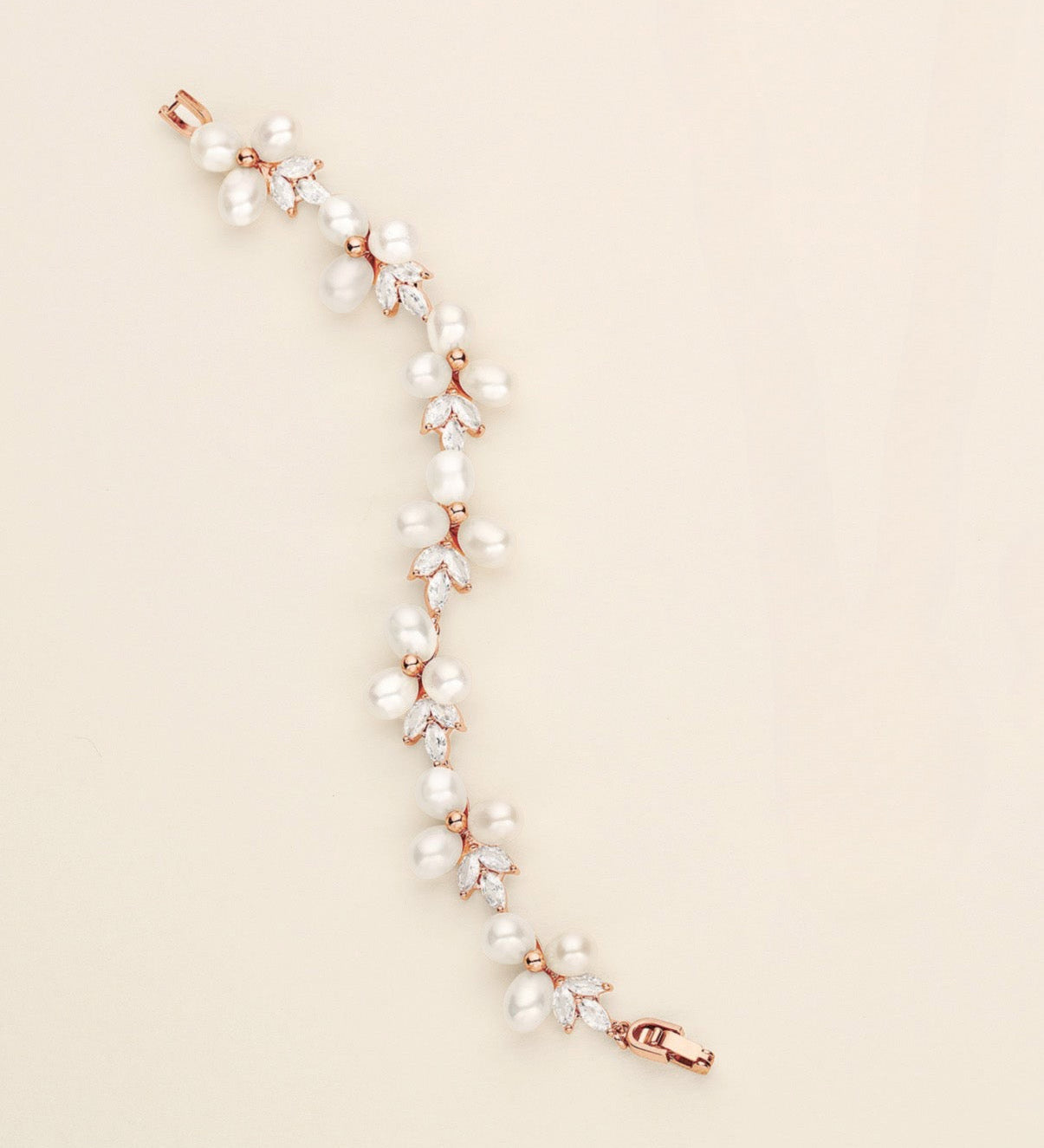 a necklace and earring set with pearls