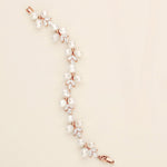 a necklace and earring set with pearls