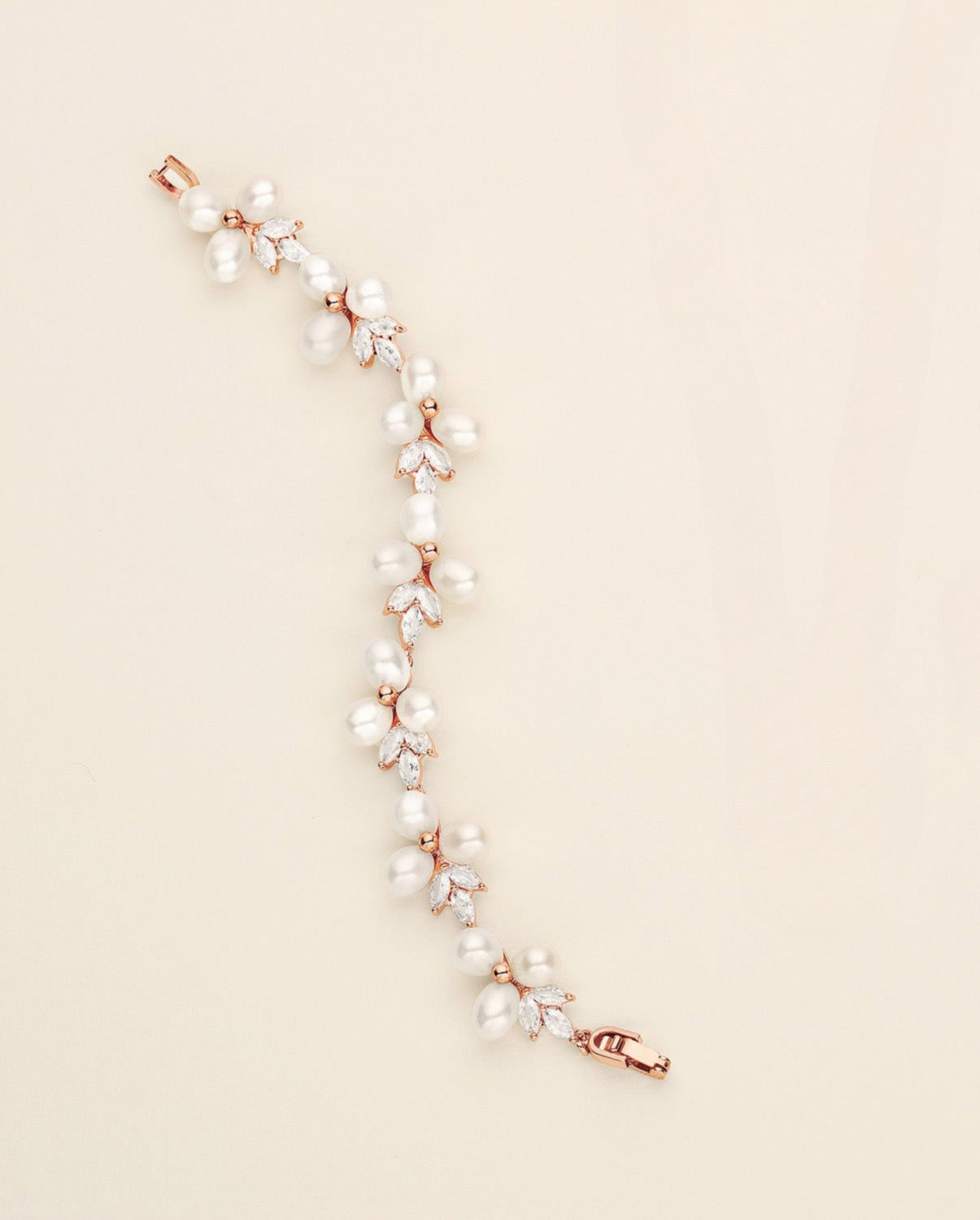 a necklace and earring set with pearls