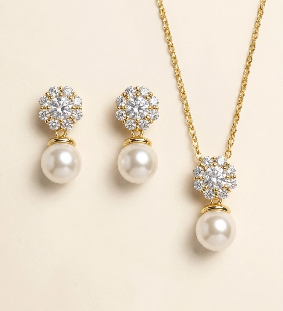 A set of elegant pearl and diamond jewelry, including earrings and a necklace, displayed against a light background.
