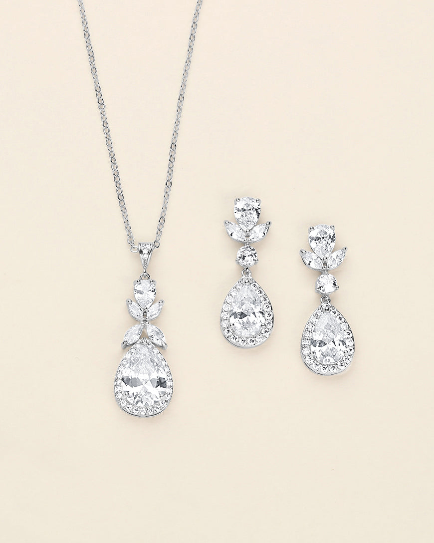 a couple of necklaces and a pair of earrings