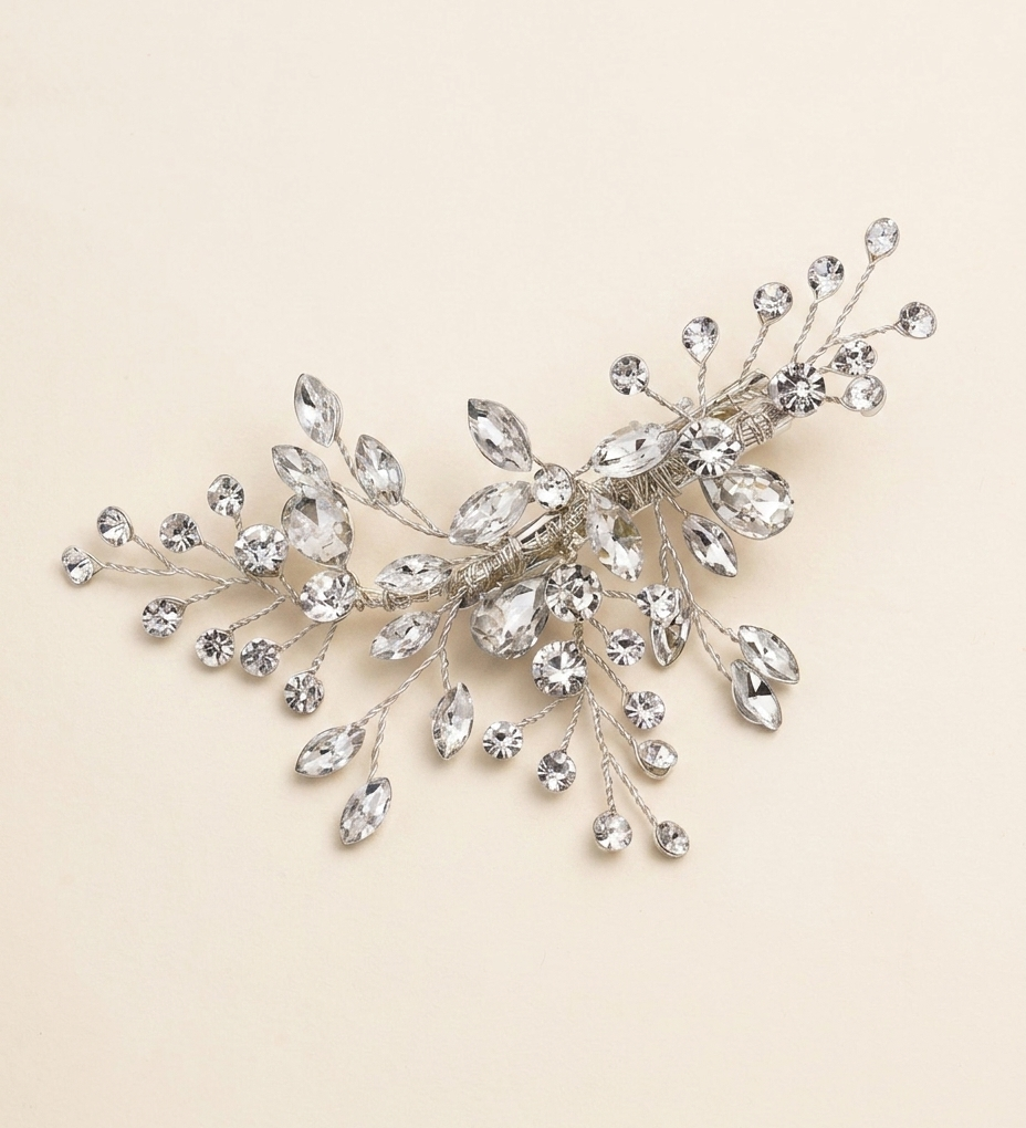 A decorative hair clip adorned with numerous sparkling crystal stones.