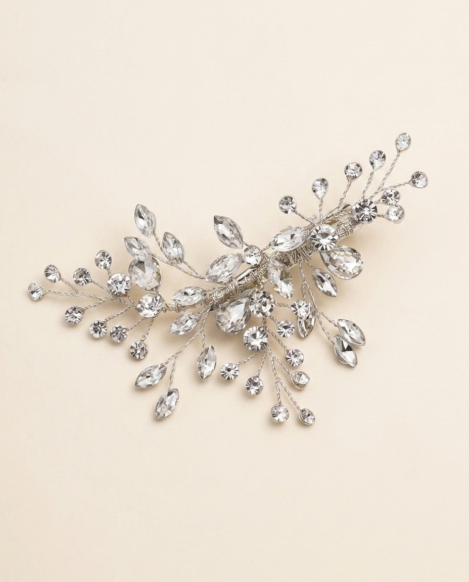 A decorative hair clip adorned with numerous sparkling crystal stones.