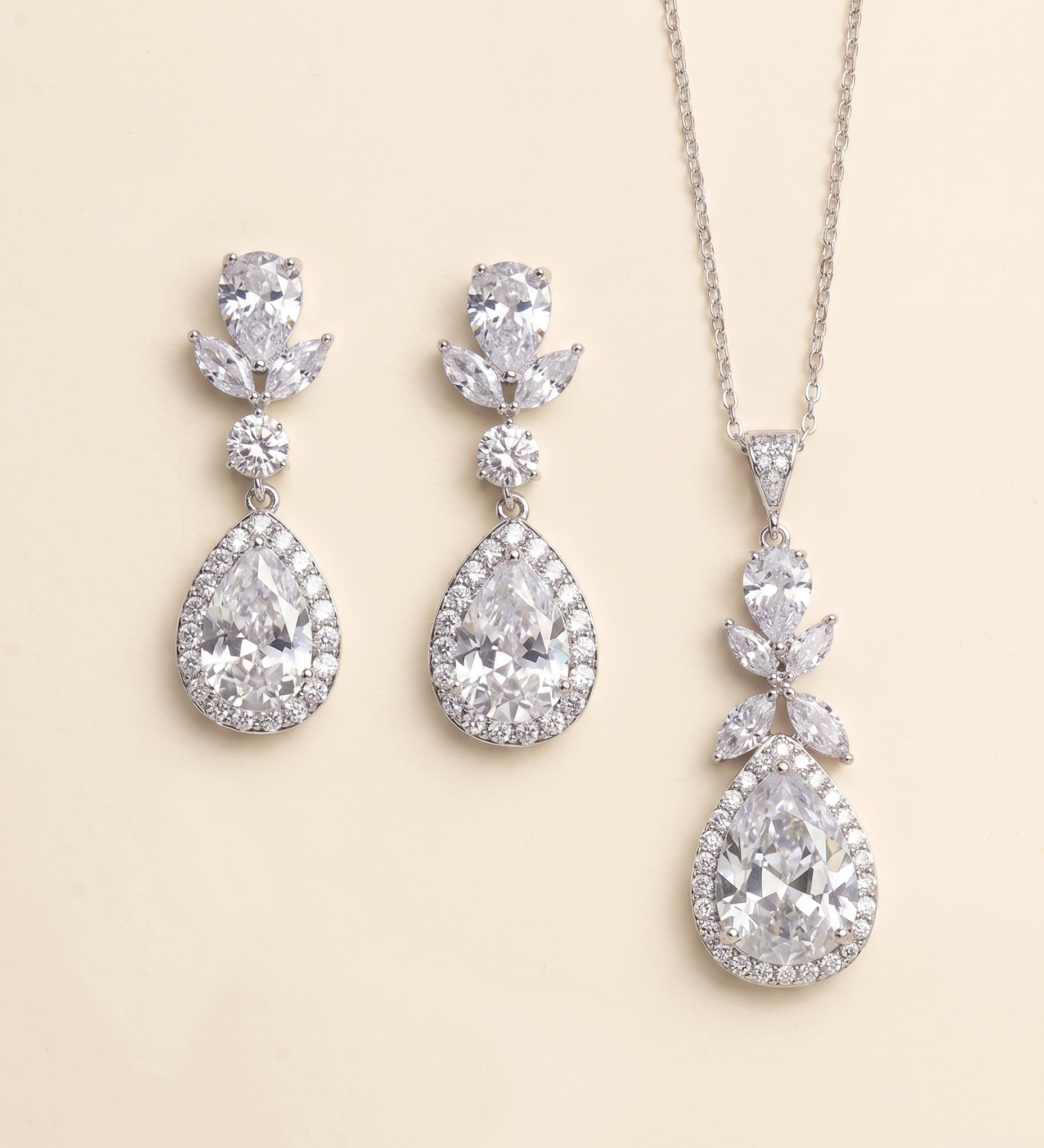 A necklace and earrings set made of sparkling diamonds.