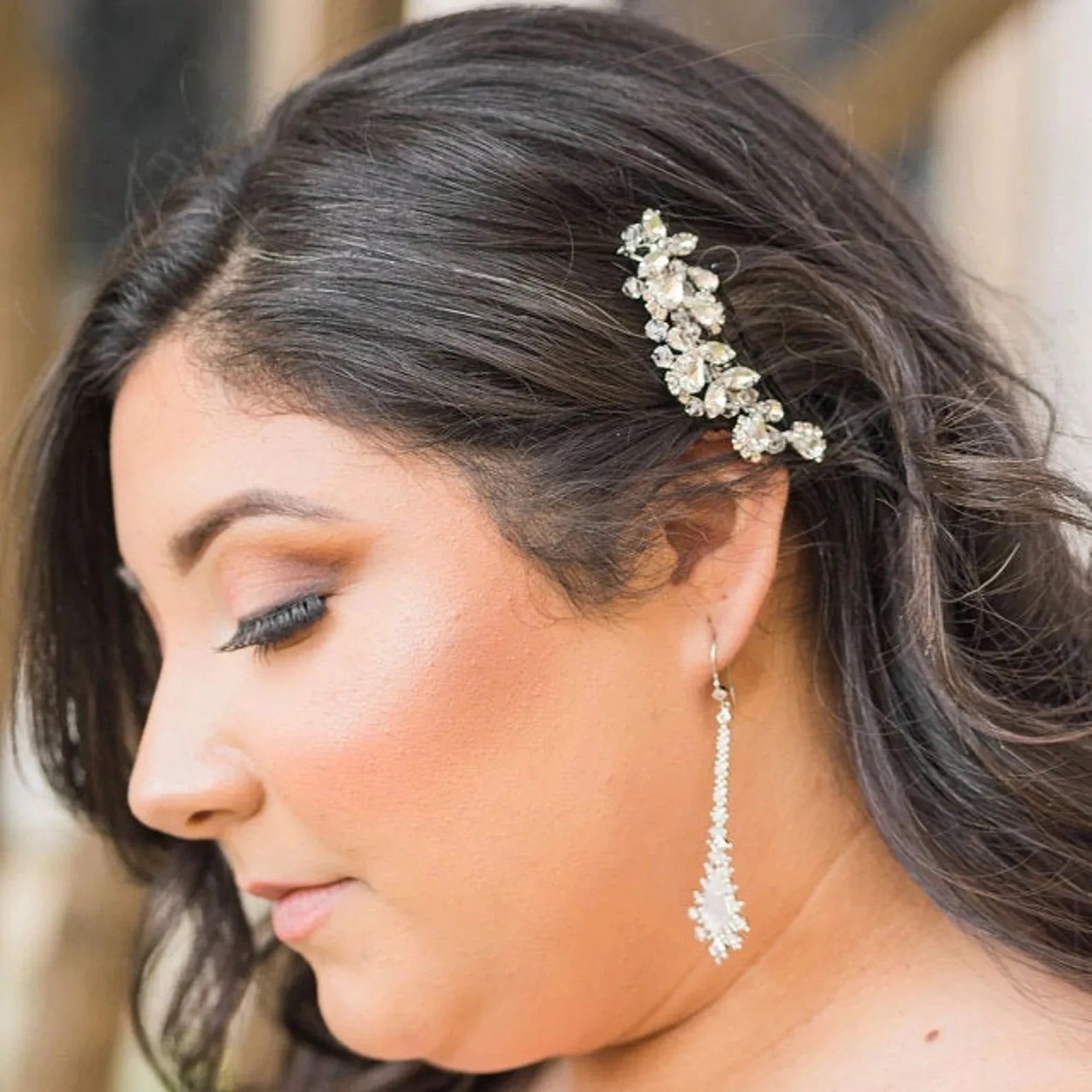 a close up of a woman wearing a hair comb