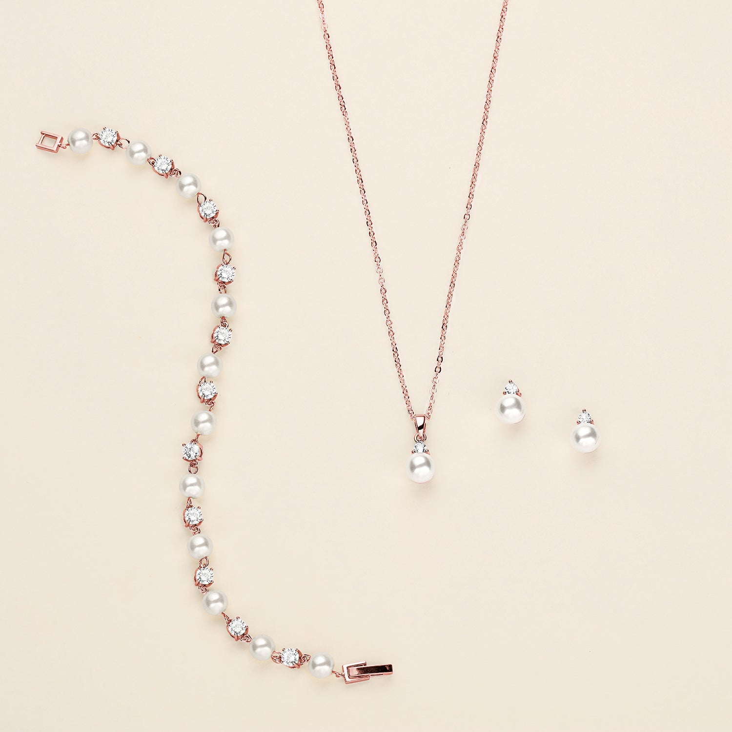 a necklace and earring set with pearls