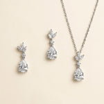 A necklace and earrings set made of sparkling diamonds.