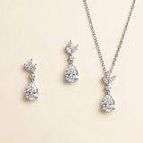 A necklace and earrings set made of sparkling diamonds.