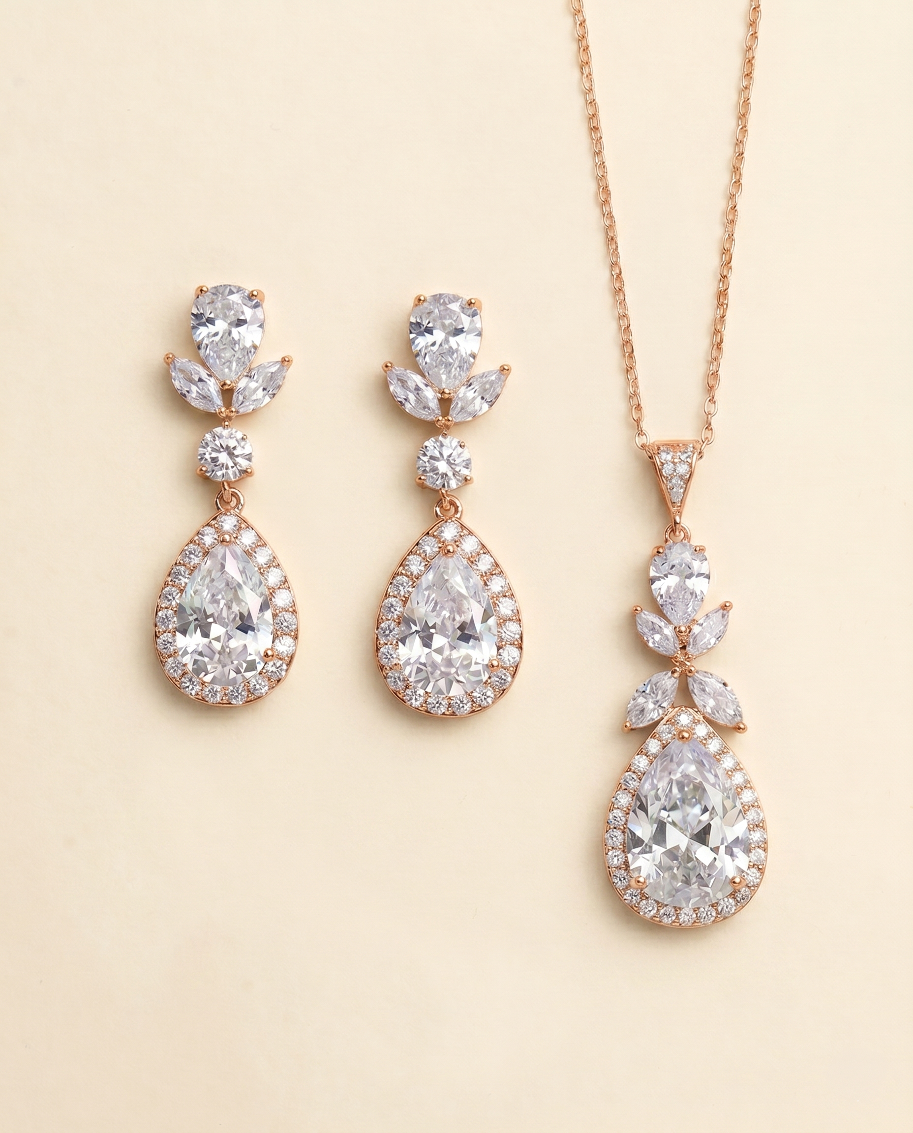 a set of elegant jewelry pieces, including a necklace and earrings, both adorned with large, sparkling diamonds.